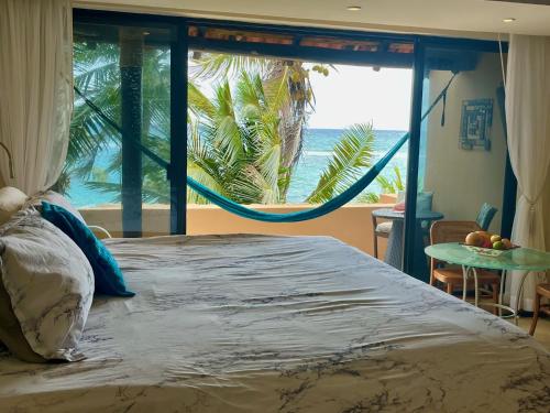 Photo #2 of Beachfront Hammock Heaven in Akumal, Mexico