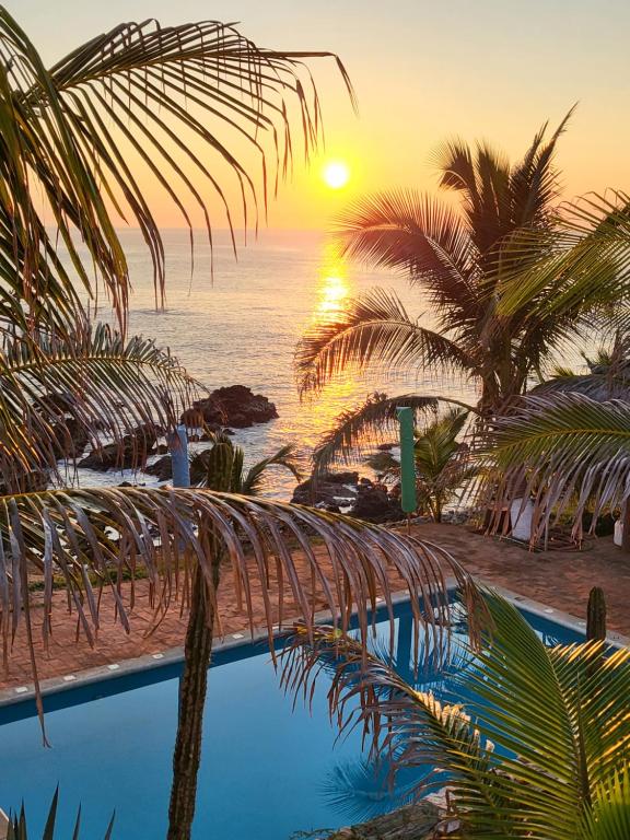 Photo of Hotel Luz de Mar ' right on the beach in Barra de Cuatunalco, Mexico