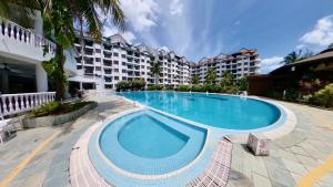 Photo #4 of 18pax GFloor 4R4B Dual-Key Doorstep To Beach, FREE BBQ Set, Wifi, 50" Smart TV in Port Dickson, Malaysia