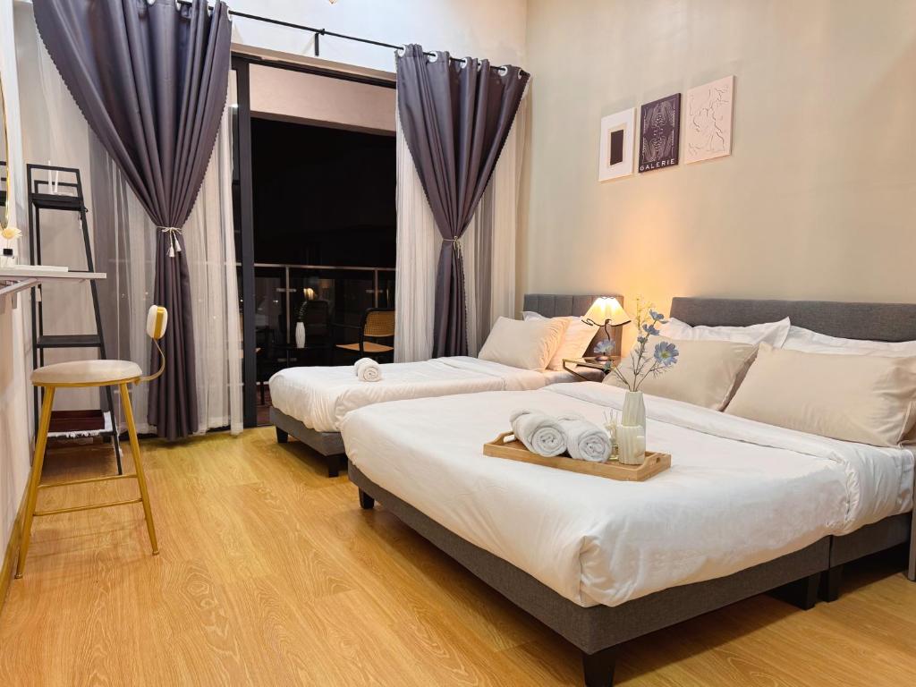 Photo #1 of Wind Serenity at Country Garden Danga Bay with 2CarParks FOC Netflix Access and YouTube Premium 3Beds3Bath for 6-13pax by Minshuku in Johor Bahru, Malaysia