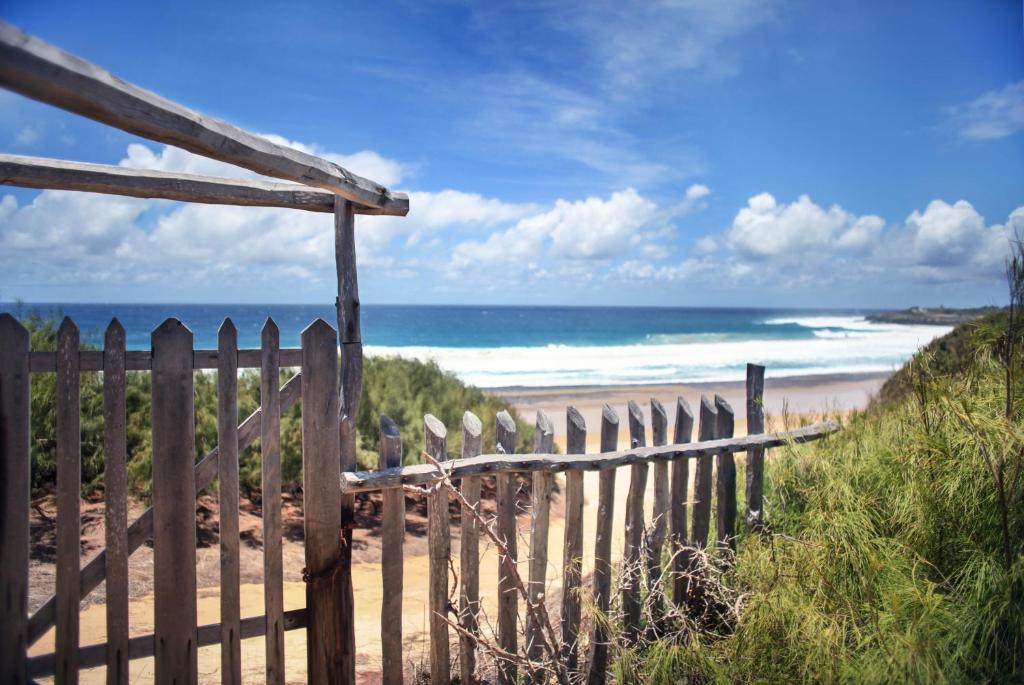 Photo of Tofinho Beach House Apartments in Praia Tofo, Mozambique