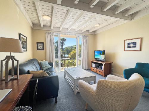 Photo #2 of Waterfront 2-Bedroom Harbour View Apartment in Akaroa, New Zealand