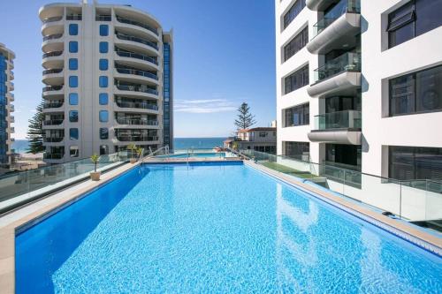 Photo #2 of Luxury Ocean & Harbour Views - Heated Pool, Main Beach & Gym in Mount Maunganui, New Zealand