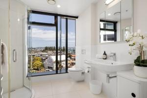 Photo #5 of Luxury Ocean & Harbour Views - Heated Pool, Main Beach & Gym in Mount Maunganui, New Zealand