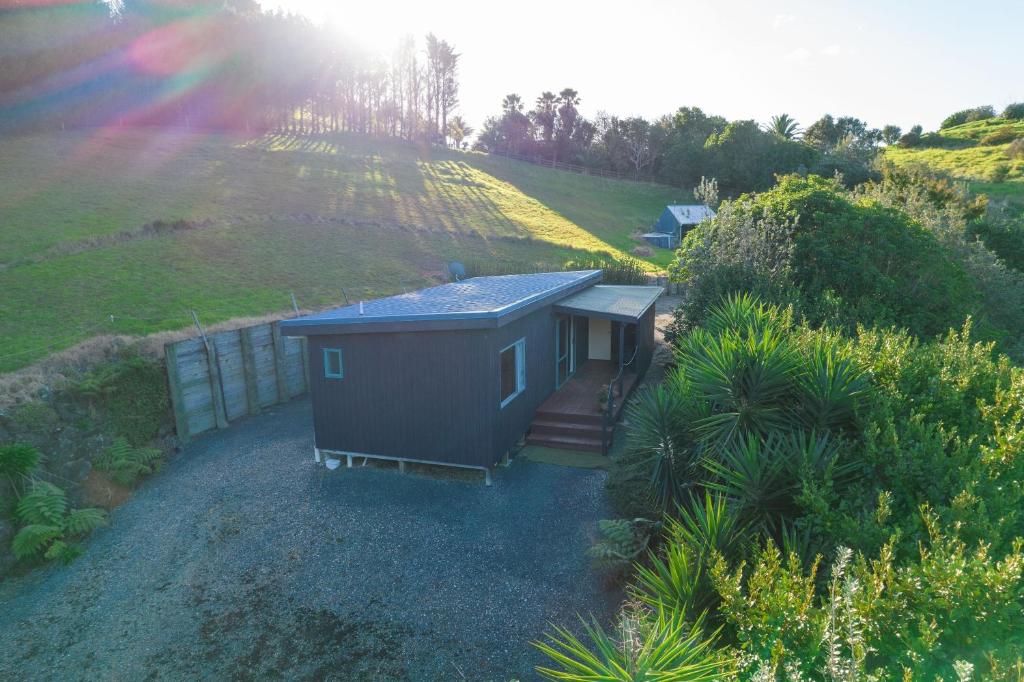 Photo #1 of Seascape Cottage - Mahinepua Bay Clifftop Retreat in Russell, New Zealand