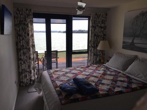 Photo #2 of Absolute Waterfront Serenity Near Auckland in Clarks Beach, New Zealand