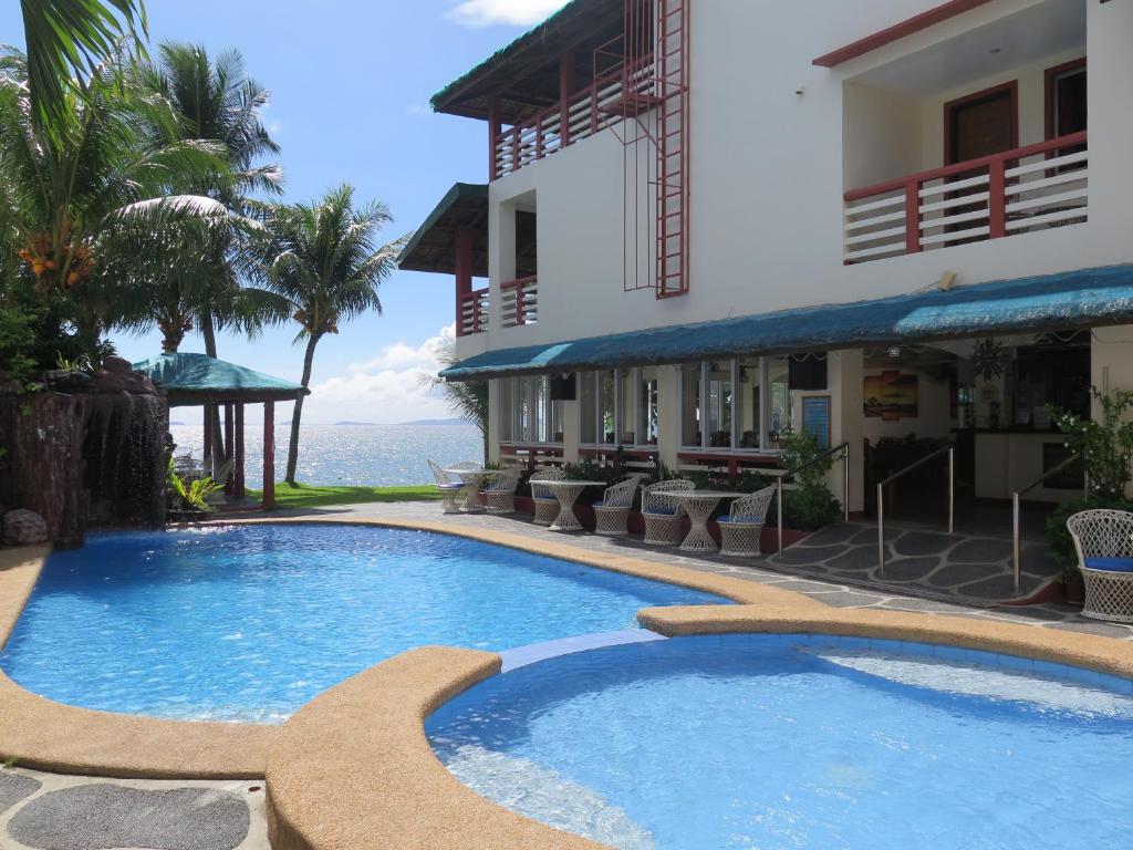 Photo of Badladz Beach and Dive Resort in Puerto Galera, Philippines