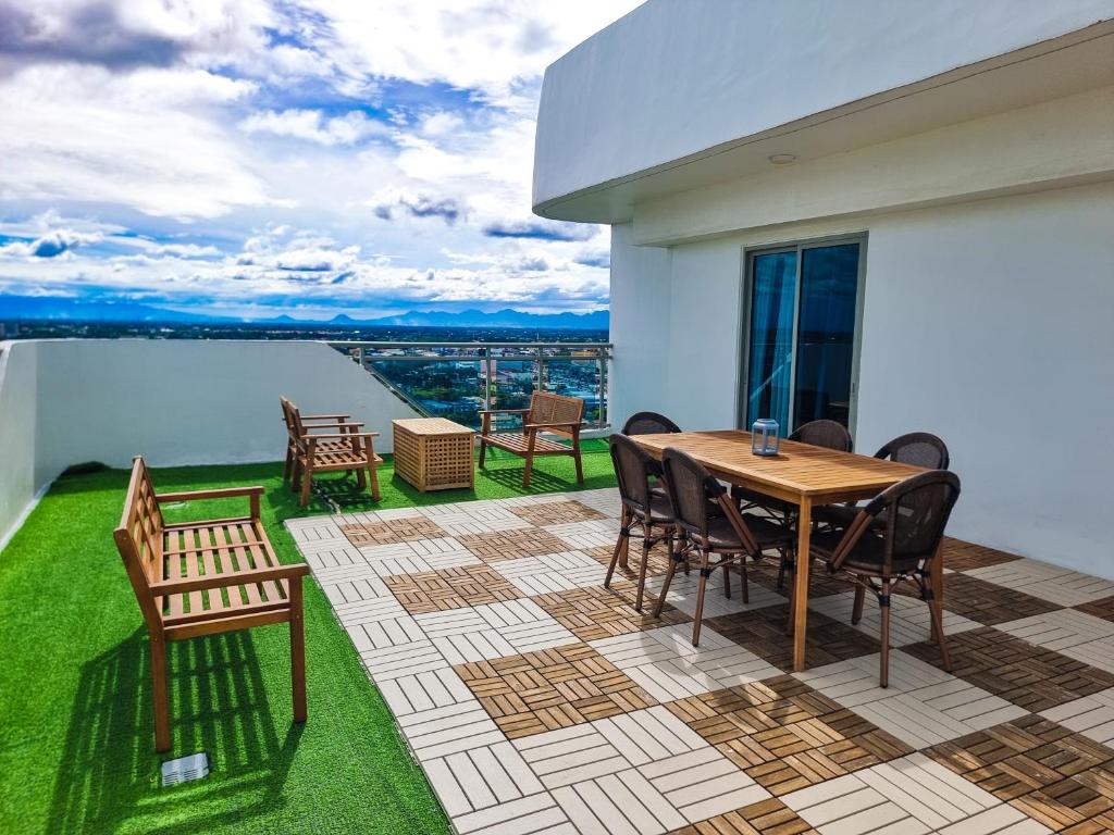 Photo #1 of 2BR Penthouse with Wide Balcony and 7ft Billiards The Polaris Penthouse at Azure North in San Fernando City, Philippines