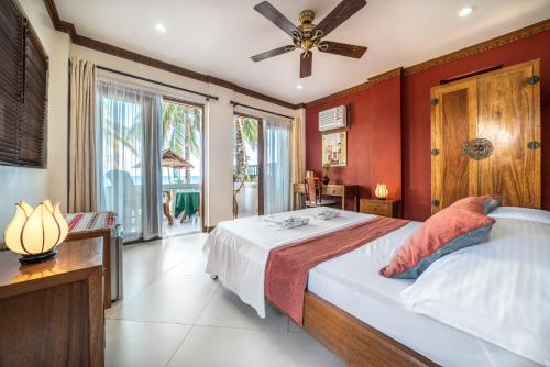 Photo #2 of The Beach House Carabao Island in San Jose, Philippines