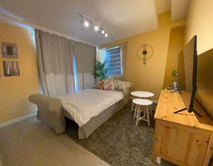 Photo #6 of Two Bedroom - The Bali Corner at Azure North in San Fernando City, Philippines