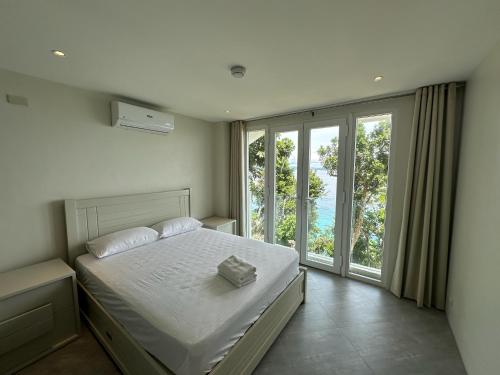 Photo #2 of Amal Villa - Luxury 2 Bed, 2 Bath Apartment with Panoramic Ocean Views, Peaceful, Private Beach in San Jose, Philippines