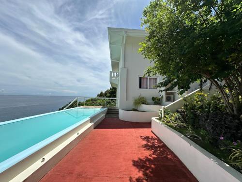 Photo #3 of Amal Villa - Luxury 2 Bed, 2 Bath Apartment with Panoramic Ocean Views, Peaceful, Private Beach in San Jose, Philippines