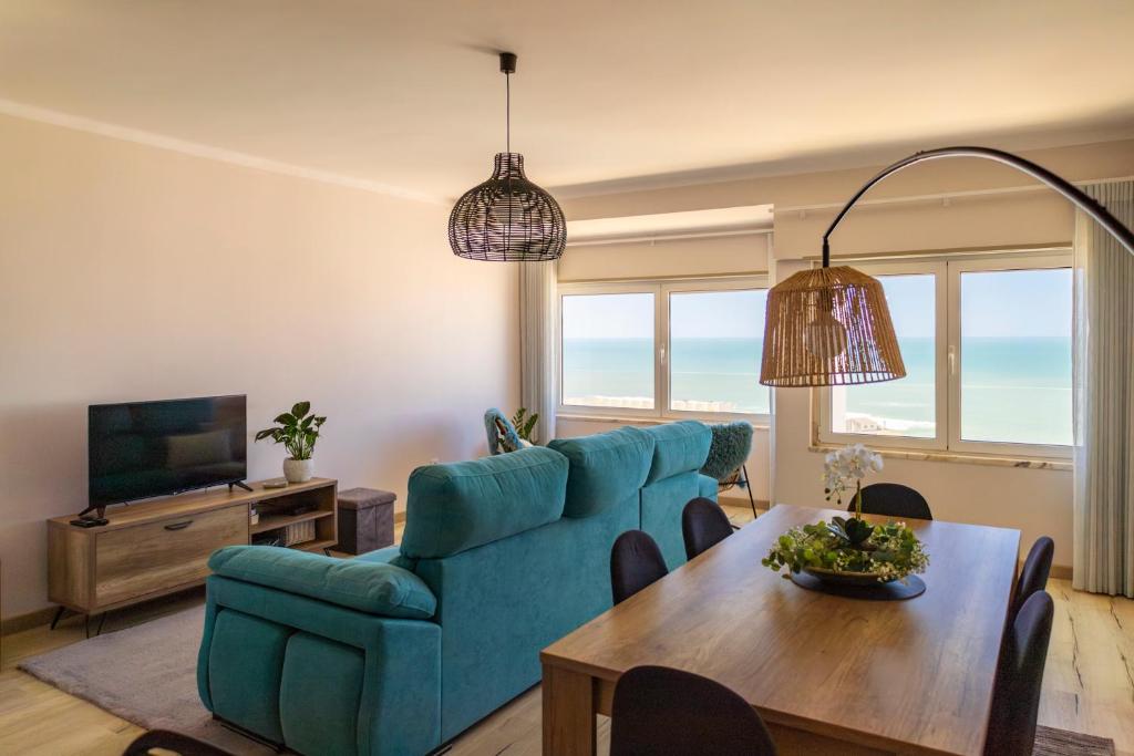 Photo #1 of Blue House in Santa Cruz with Sea View in A dos Cunhados, Portugal