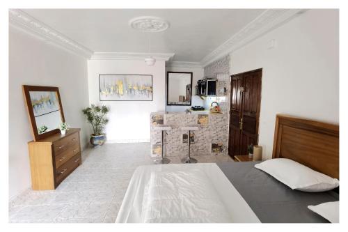 Photo #2 of "Le BAOBAB" - CALME - CLIM - WIFI - White Butterfly Hotels in Thies, Senegal