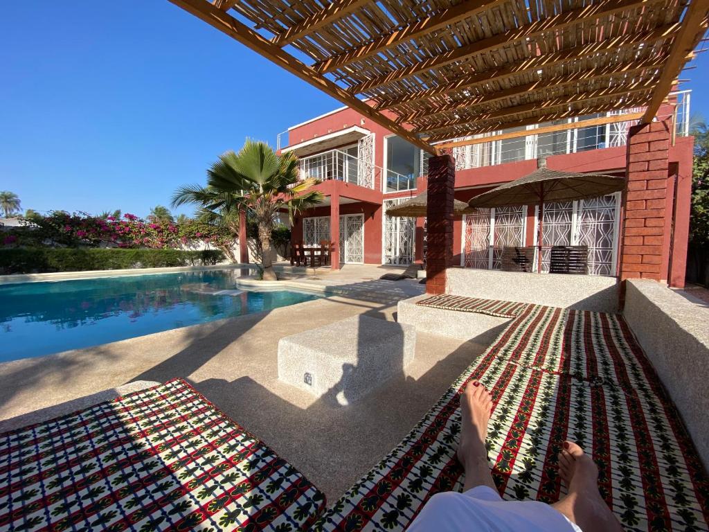 Photo of Villa avec piscine entre plage et Siné Saloum in Djiffer, Senegal
