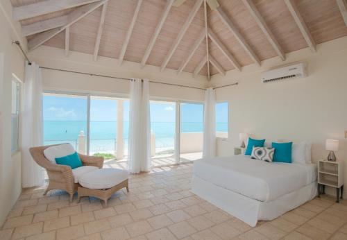 Photo #2 of Aqua Del Rose 3 BR Beachfront Cottage in Long Bay Hills, Turks and Caicos Islands