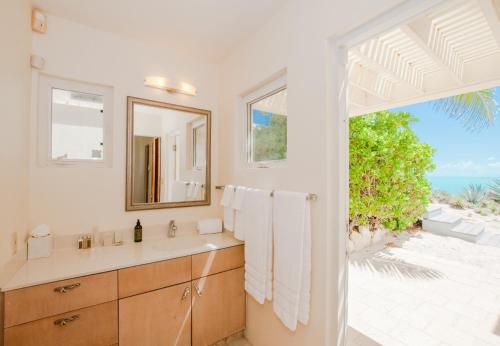 Photo #3 of Aqua Del Rose 3 BR Beachfront Cottage in Long Bay Hills, Turks and Caicos Islands