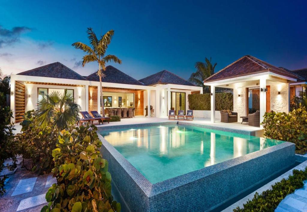 Photo of Brise De Mer 6 BR Villa - Beachfront in Providenciales, Turks and Caicos Islands
