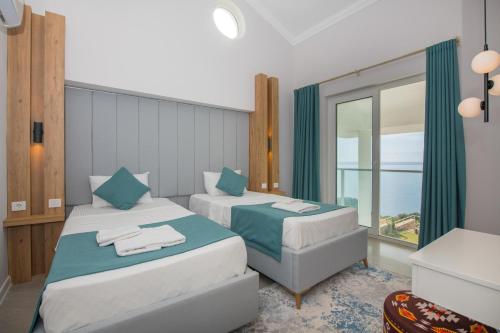 Photo #2 of BEACHFRONT SARI VILLA WİTH PRIVATE SWIMMING POOL in Kaş, Turkey