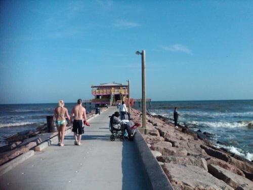 Photo #3 of Sun Splashed Condo! Steps to Beach and 2 Pools Galveston Island in Galveston, TX