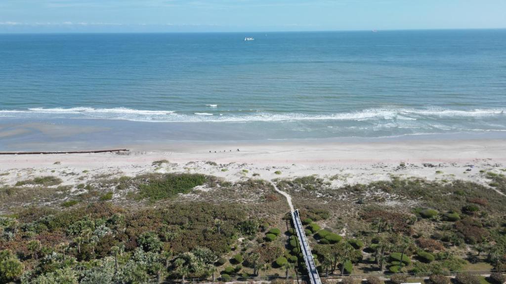 Photo of Enchanting 2-Bedroom Ground Floor Beach Condo at Cape Canaveral WiFi & AC in Cape Canaveral, FL
