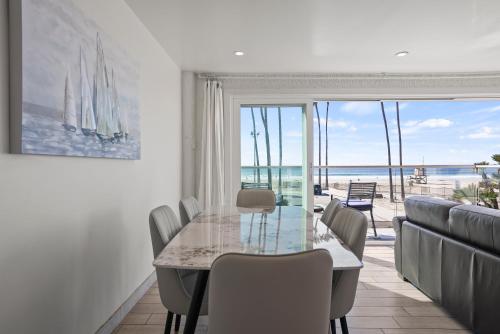 Photo #3 of Beachfront Retreat with Ocean Views Private Rooftop Deck Walk to Pier and Town in Newport Beach, CA