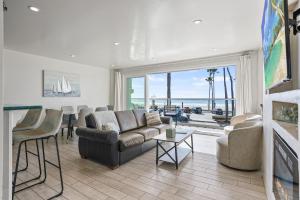 Photo #5 of Beachfront Retreat with Ocean Views Private Rooftop Deck Walk to Pier and Town in Newport Beach, CA