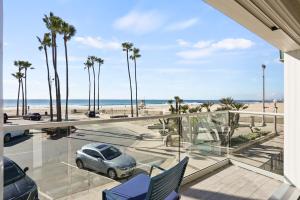 Photo #6 of Beachfront Retreat with Ocean Views Private Rooftop Deck Walk to Pier and Town in Newport Beach, CA