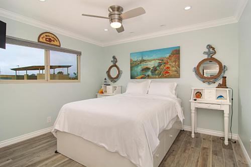 Photo #2 of 201A Beach View, 30 Steps to the sand or pool, Corner condo with extra windows and views in Oceanside, CA