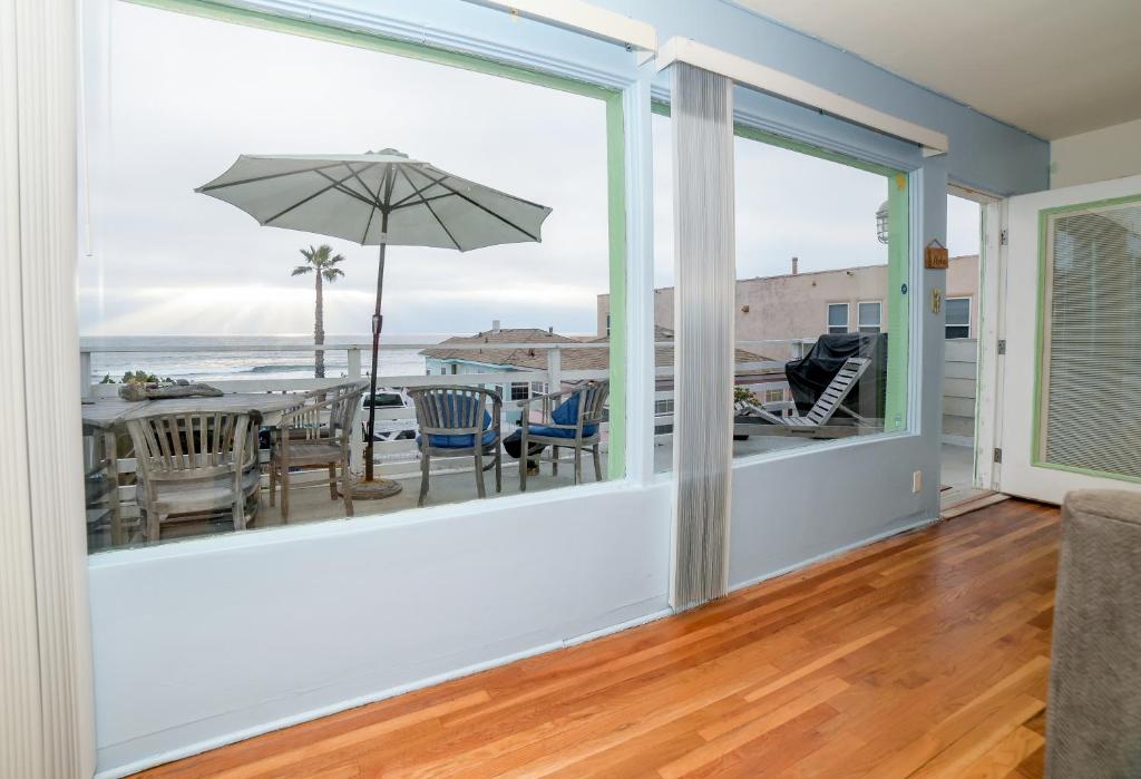 Photo #1 of BEACHFRONT COTTAGE UPPER UNIT in Oceanside, CA