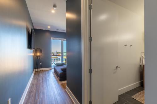 Photo #3 of Modern 4 BR Luxury Condo with Rooftop Pool Next to the Hangout! in Gulf Shores, AL