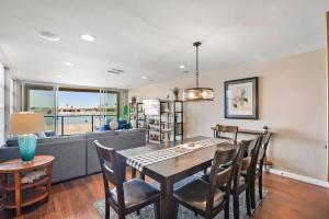 Photo #4 of Stunning Bayfront condo with gorgeous views, garage, massive roof deck & AC - dogs welcome! in San Diego, CA