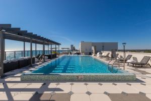 Photo #4 of Spacious, 5 BR on the Beach with Rooftop Pool Next to the Hangout! in Gulf Shores, AL