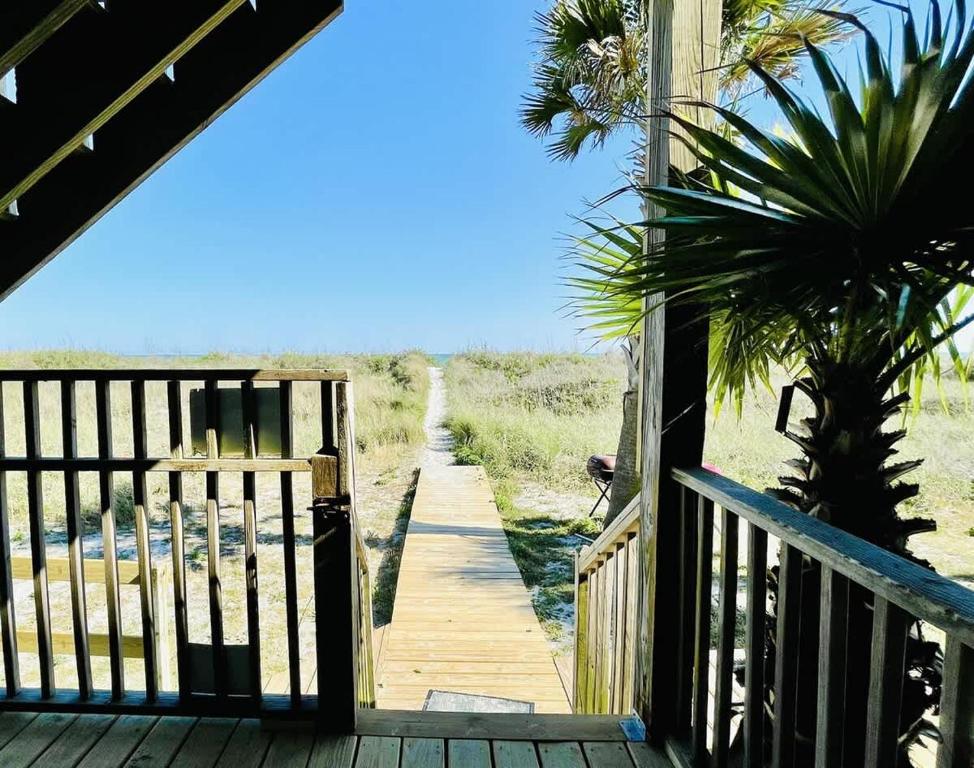 Photo #1 of OCEANFRONT HOUSE ON THE SAND 2 Kings 4br 4ba 1st Floor of Triplex SLEEP 12 PGP1 in Myrtle Beach, SC