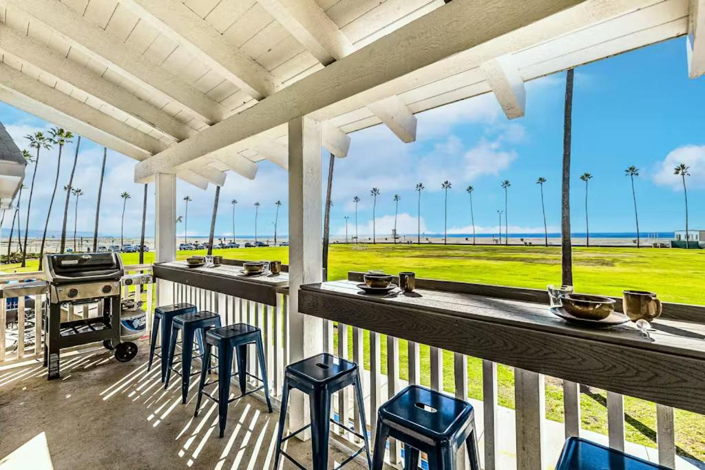 Photo #1 of Stunning 2nd Floor Beachfront Home with Balcony, Ocean Views, and Prime Location in Newport Beach, CA
