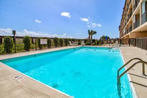 Photo #4 of Oceanfront * Pool * Elevator * Boardwalk in Carolina Beach, NC
