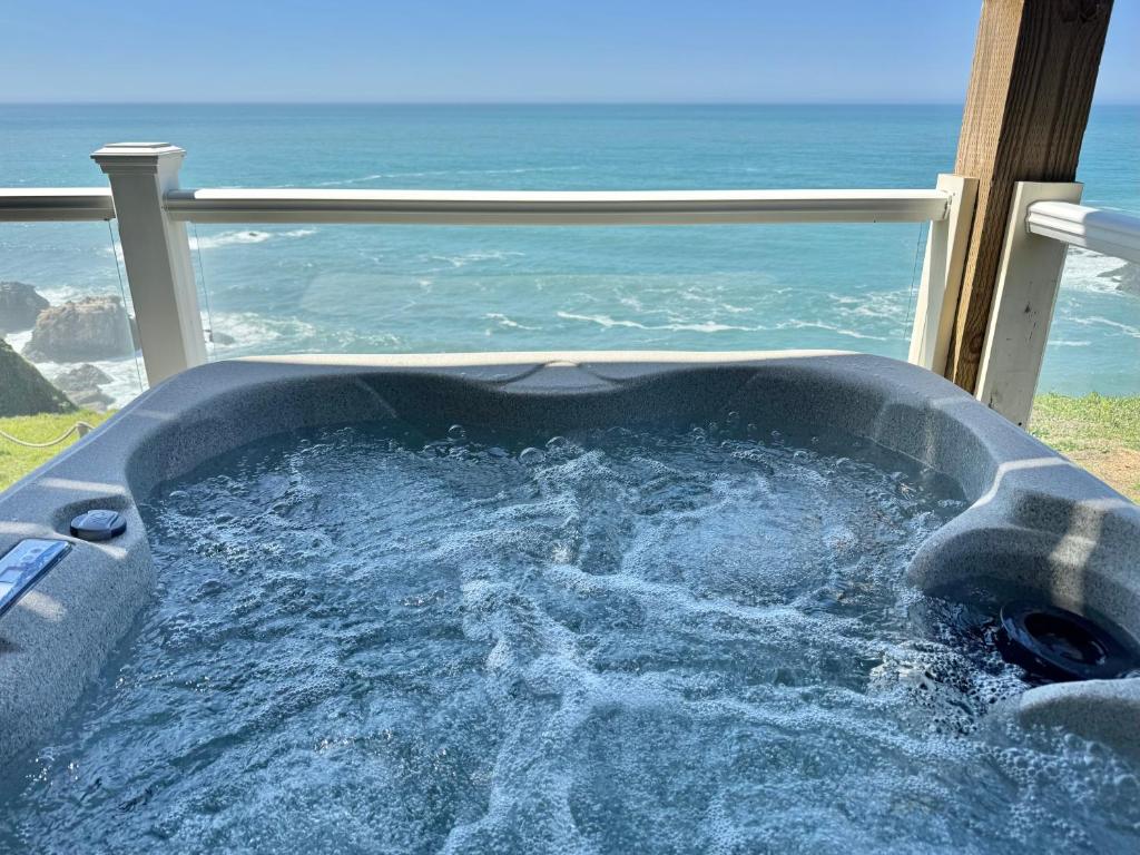 Photo of Starfish by OceanviewHotTubs Oceanfront Tesla chrging Shelter Cove Oceanfront in Whitethorn, CA