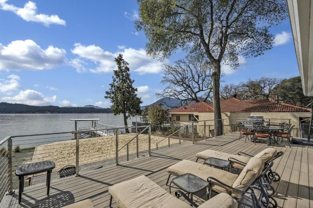 Photo of Sandy Feet Retreat -- Lakefront Retreat With Sand Volleyball Court! in Clearlake Oaks, CA