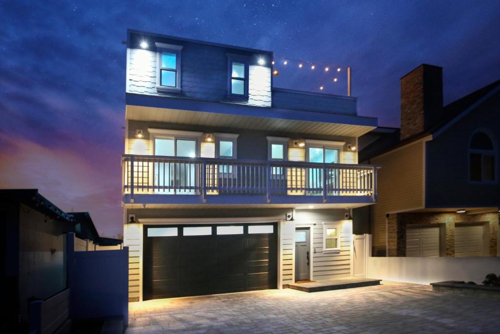 Photo #1 of Luxury Beach Home - Steps to the Sand, Game Room, Firepit, Deck in Oxnard, CA