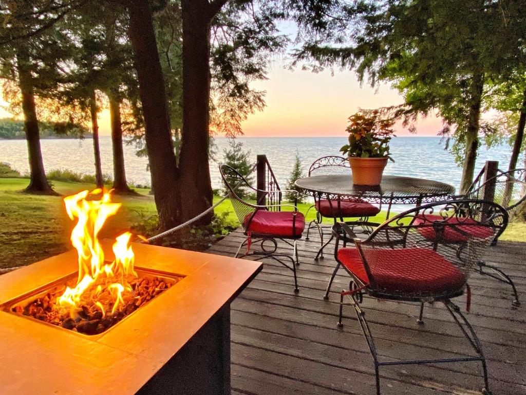 Photo of Pine Cottage Lakefront Hot Tub Fire Pit in Sodus, NY