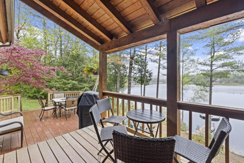 Photo of Lakefront Wprivate Beach - Luxury Log House! in Sanbornton, NH