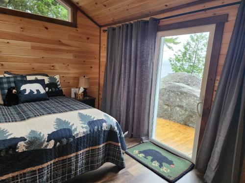 Photo #2 of Luxurious and very private lake front cottage in Millinocket, ME