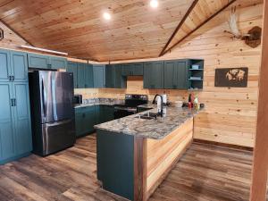 Photo #4 of Luxurious and very private lake front cottage in Millinocket, ME