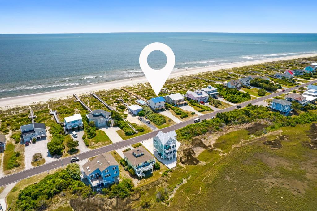 Photo of A Coconut Hut Brunswick Vacation Rentals in Caswell Beach, NC