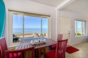 Photo #4 of Pacific Haus - 8BR Oceanfront Getaway - Private Beach - Fire Pit - Beach Gear in Oceanside, CA