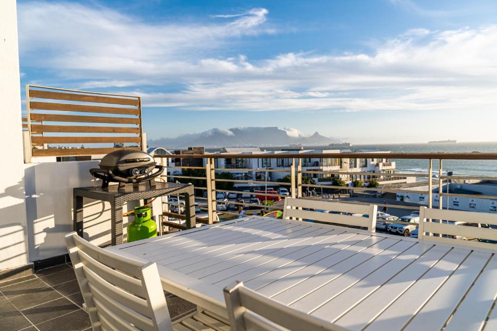 Photo #1 of Panoramic Ocean View Beachfront Top floor 2 bed, Big Bay- 212 Eden on the Bay in Cape Town, South Africa